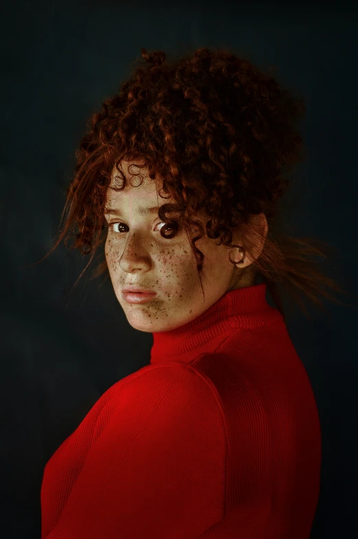 a woman in red wearing a neck tie