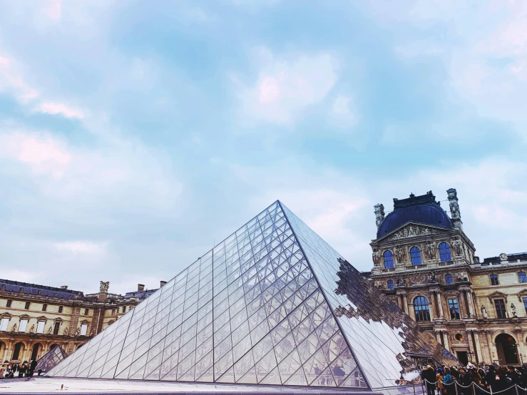 a pyramid is sitting near a group of people