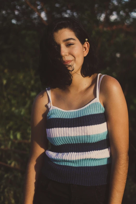 woman smiling and making a funny face with tongue