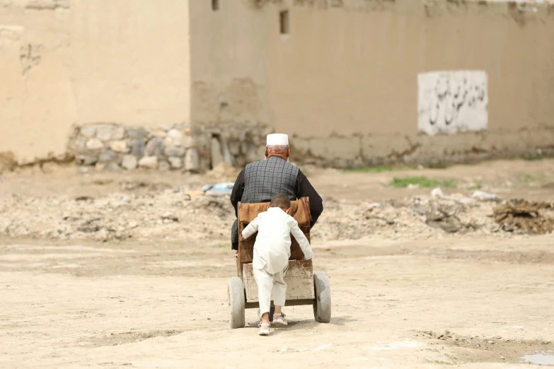 a man riding on the back of a brown horse