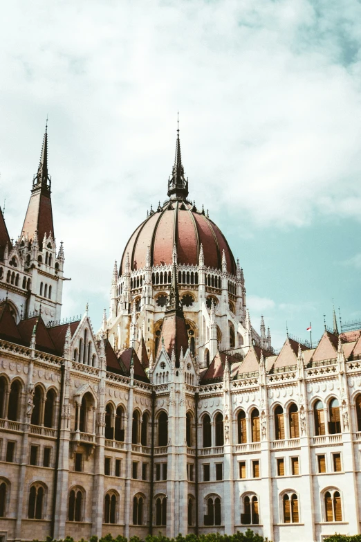 the old style building has two domed domes on it