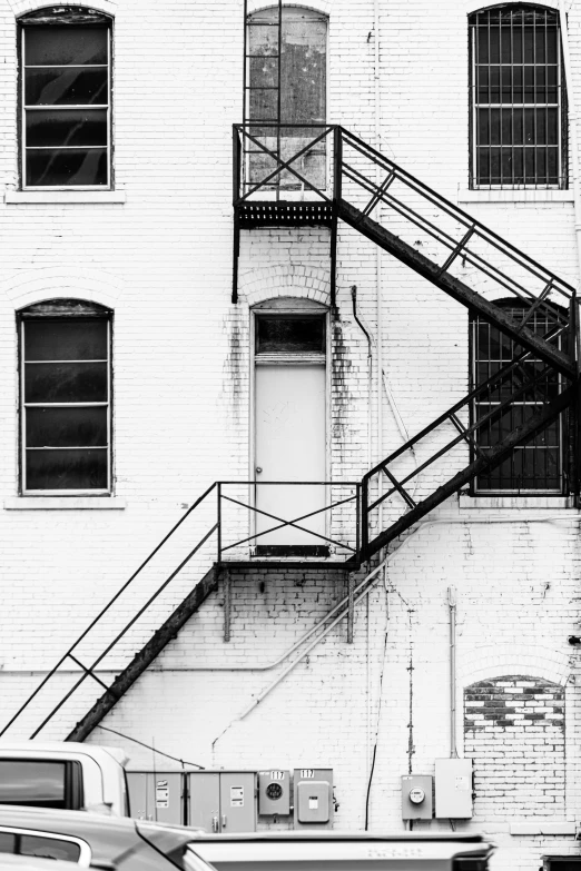 two large fire escapes are on the side of a building