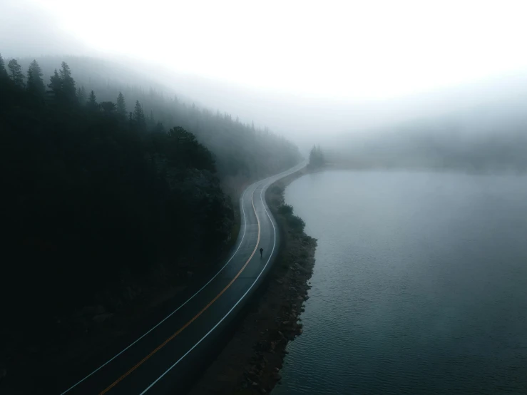 a train on a train track over a river