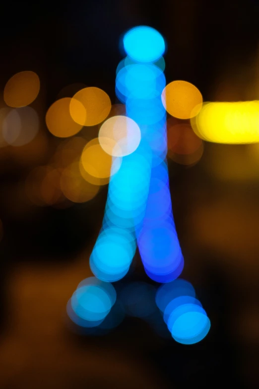 a blurry picture of the base of the eiffel tower
