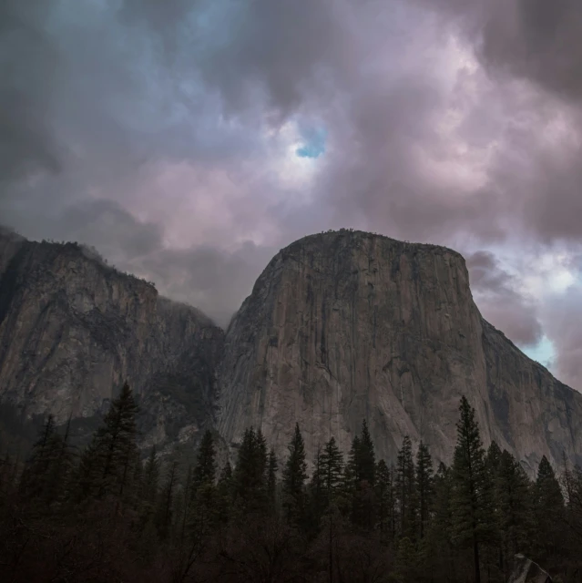 a mountain is covered in a large rock formation