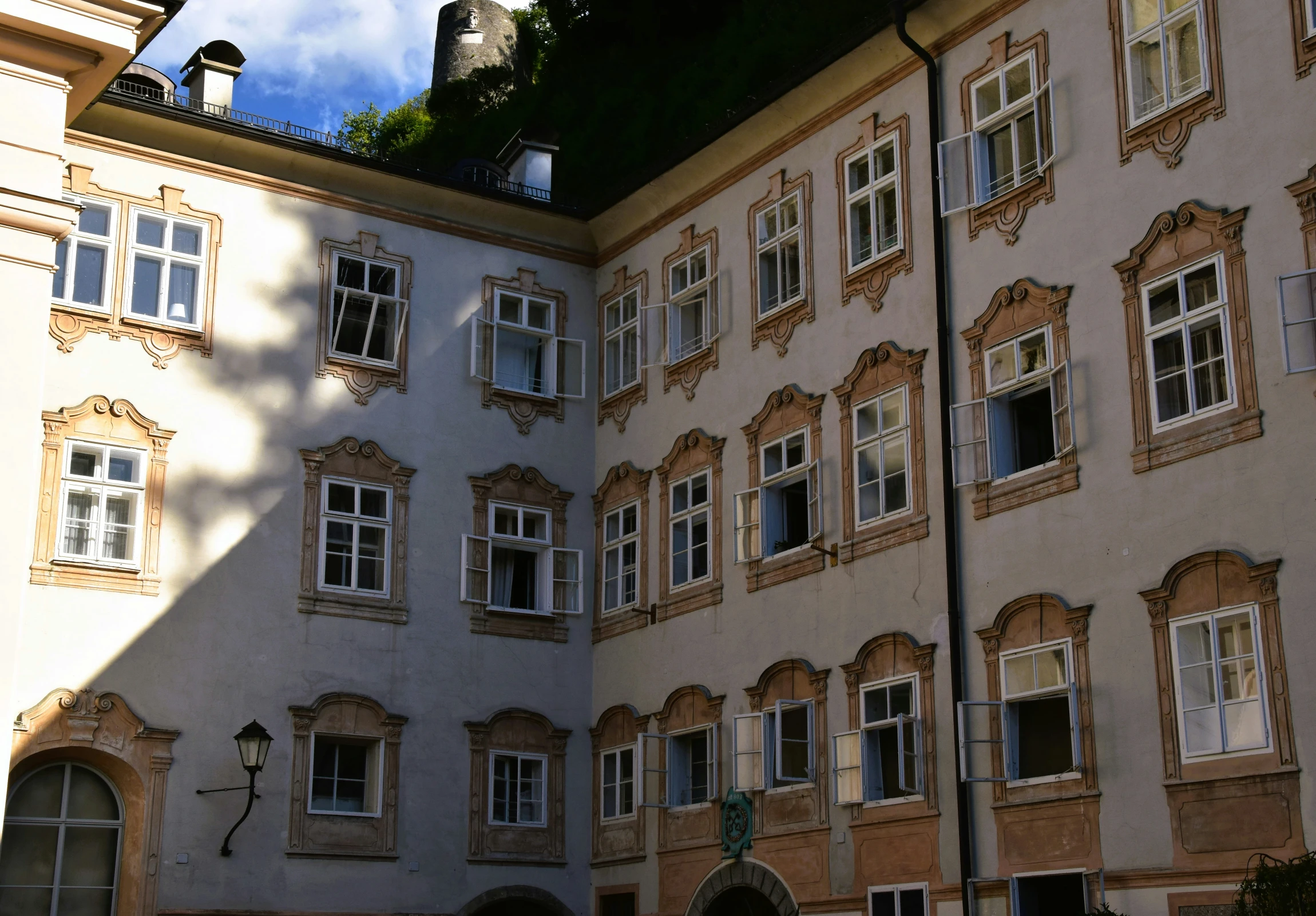 a tall building with lots of windows and arches