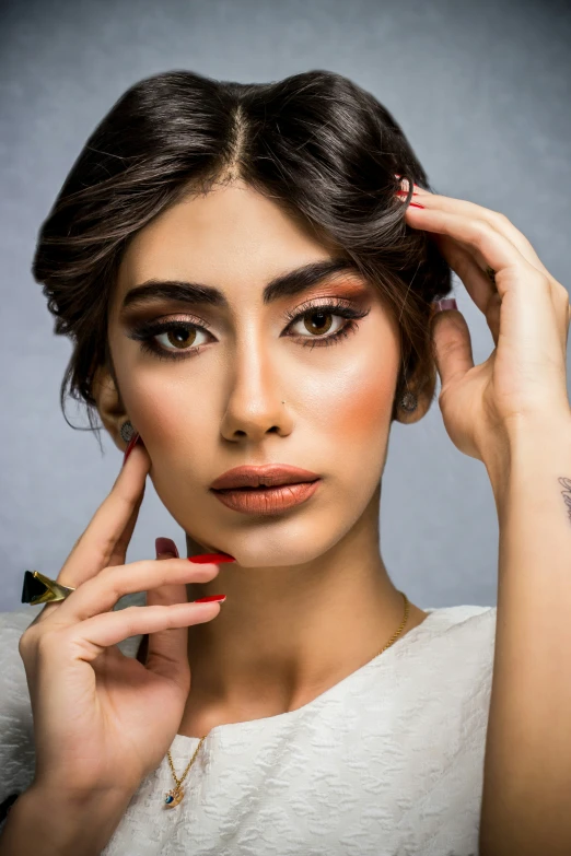 a woman in white shirt with lipstick on her face