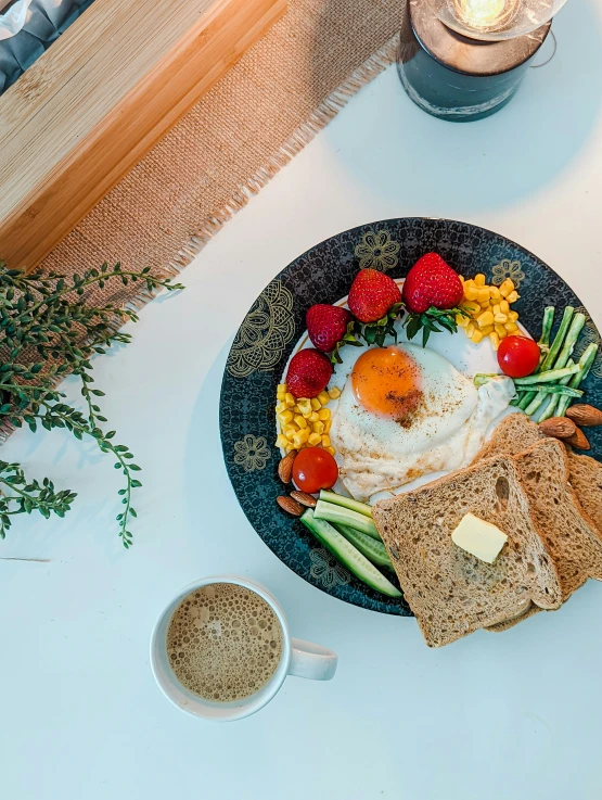 a plate with several fruit and vegetables on top of it