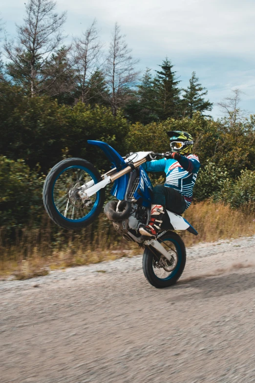 a man that is on a dirt bike