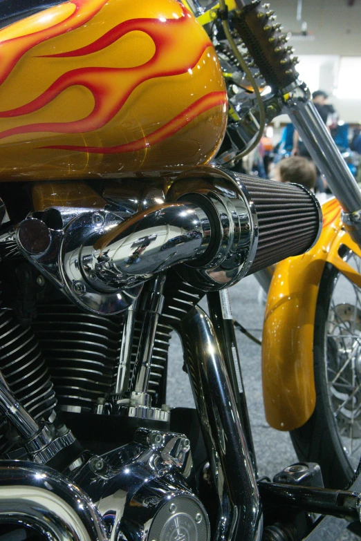 a close up of a motorcycle that is on display