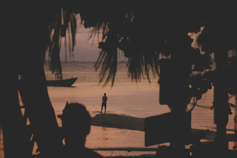 a man standing on a boat in the water