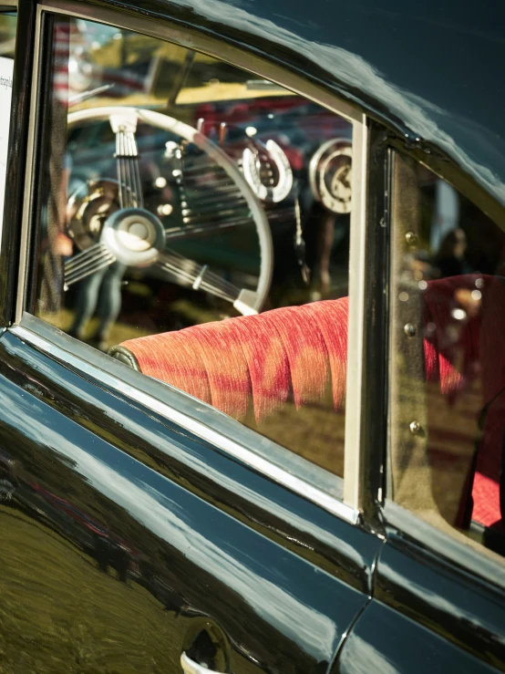 the back window of a car is seen from inside