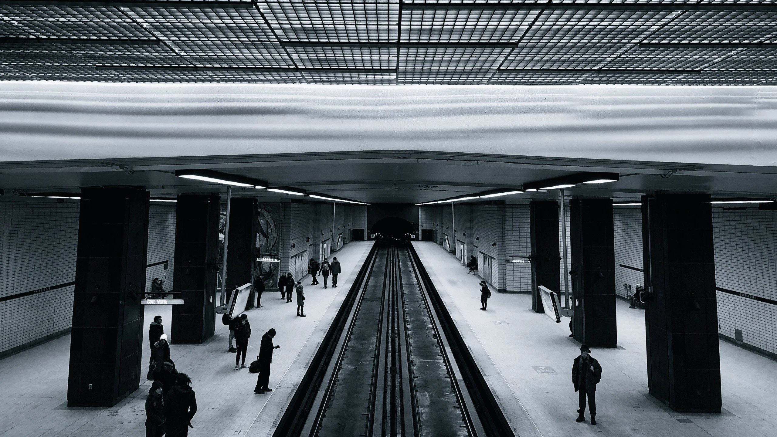 black and white pograph of a subway station