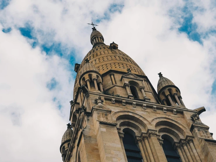 the spire is on top of the tall building