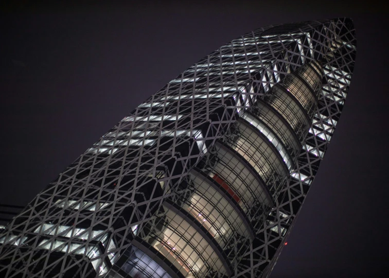 a very tall building lit up at night