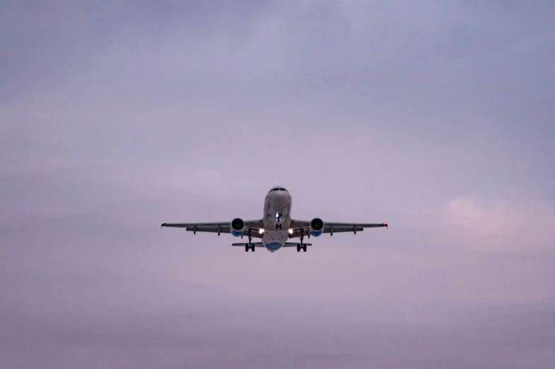 the plane is on a runway above the snow