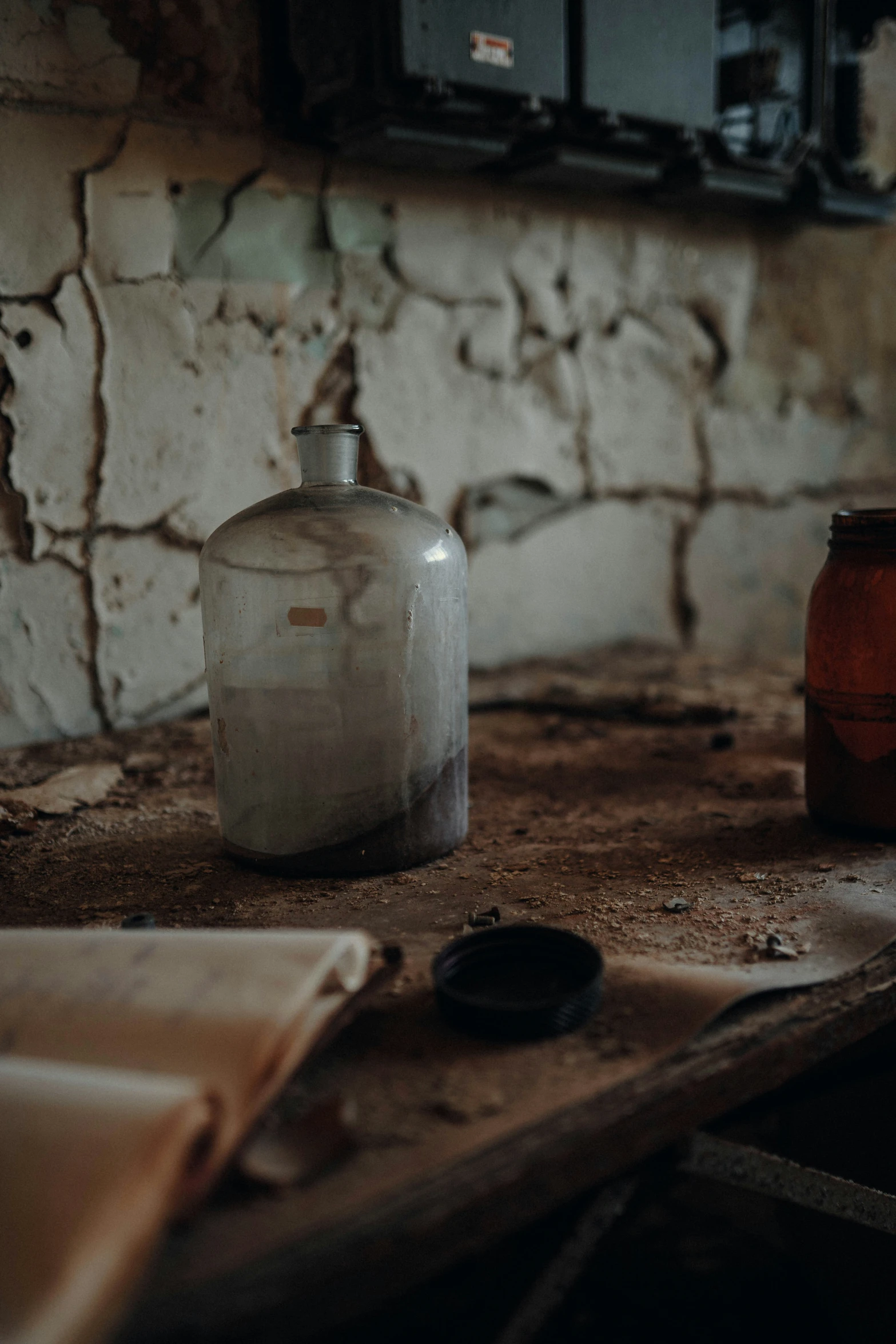 a couple of jars on top of a wooden table