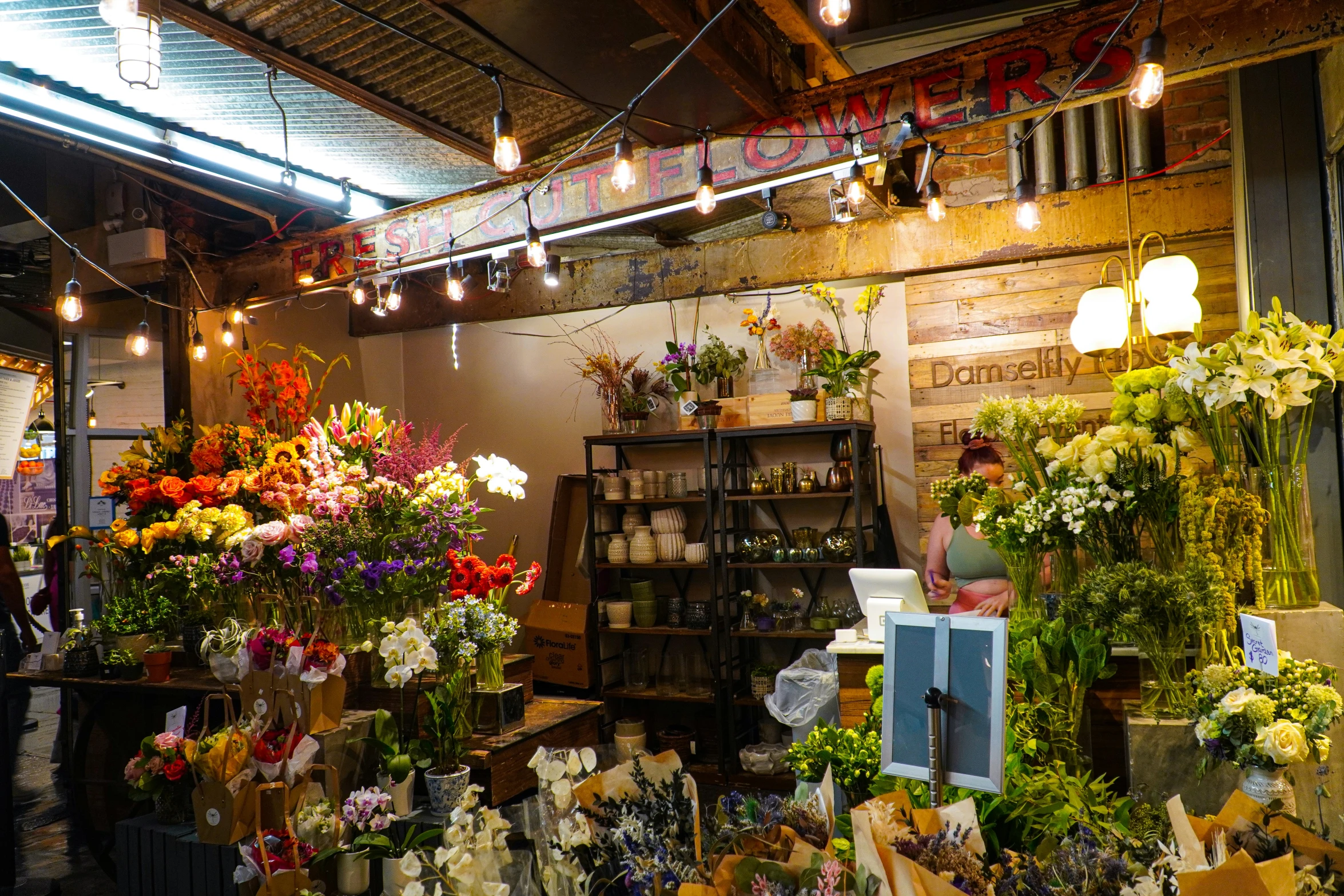 there is a flower shop with large flowers