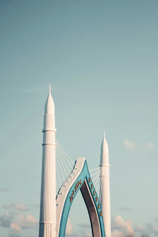 an image of a tall white structure that is on top of a hill