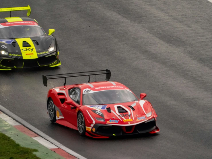 two race cars on a race track