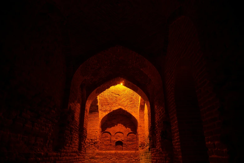 the doorway to a building with a clock in the wall