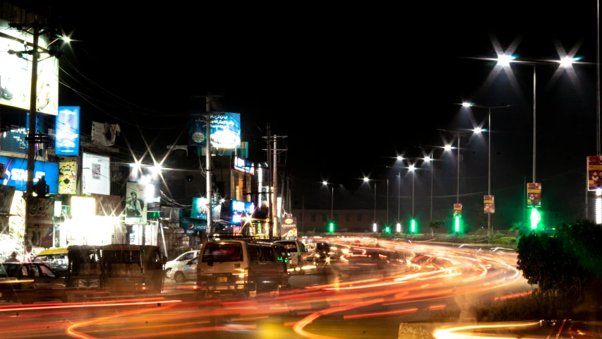 the city street is busy at night time