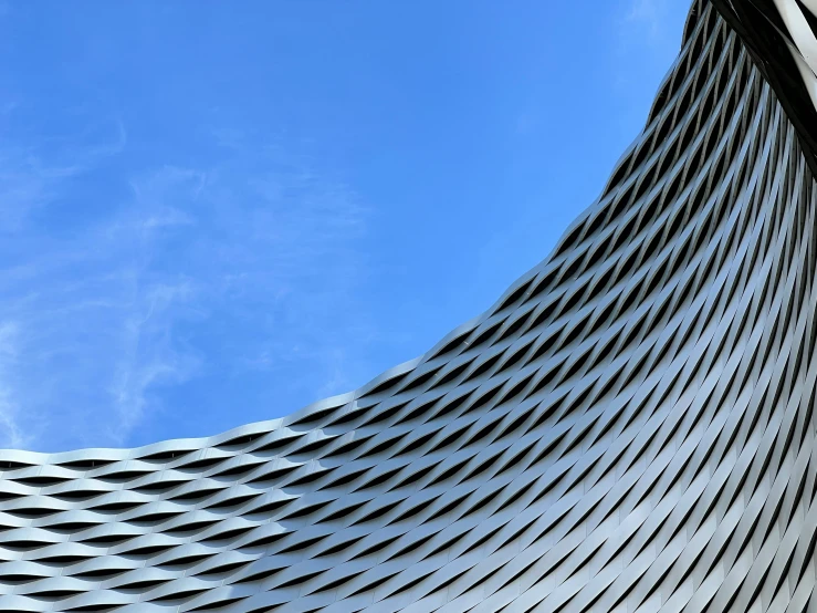 the roof and side of a curved building