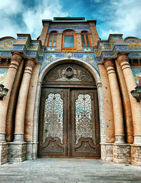 an ornate door and entry way to a building