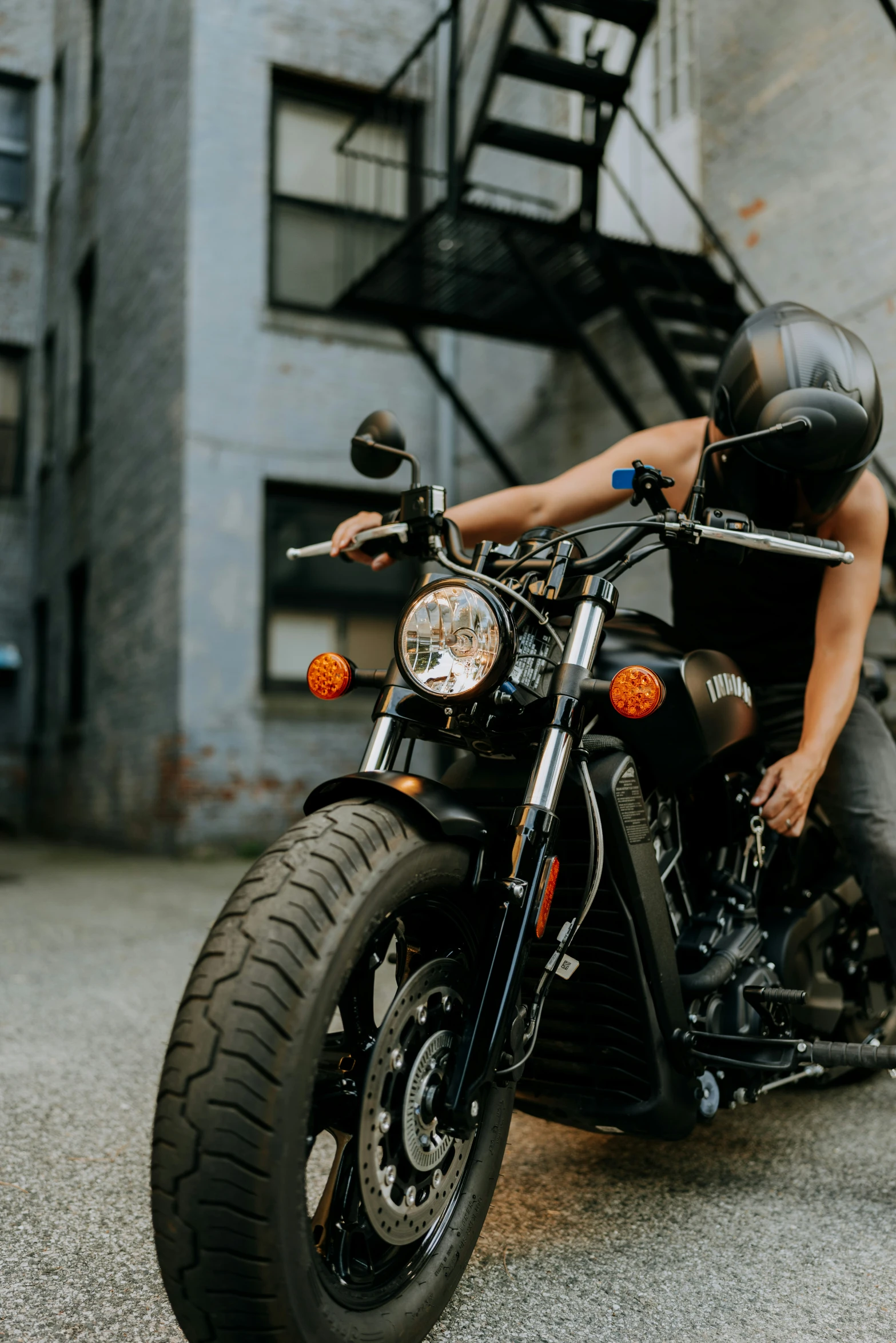 a man riding a motorcycle on a street