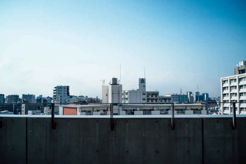 the city skyline is seen through the windows of the buildings