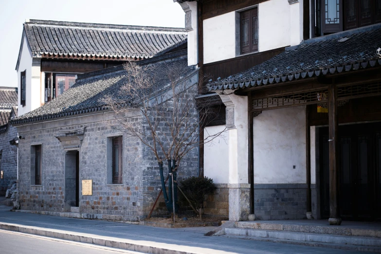 a narrow street lined with old buildings