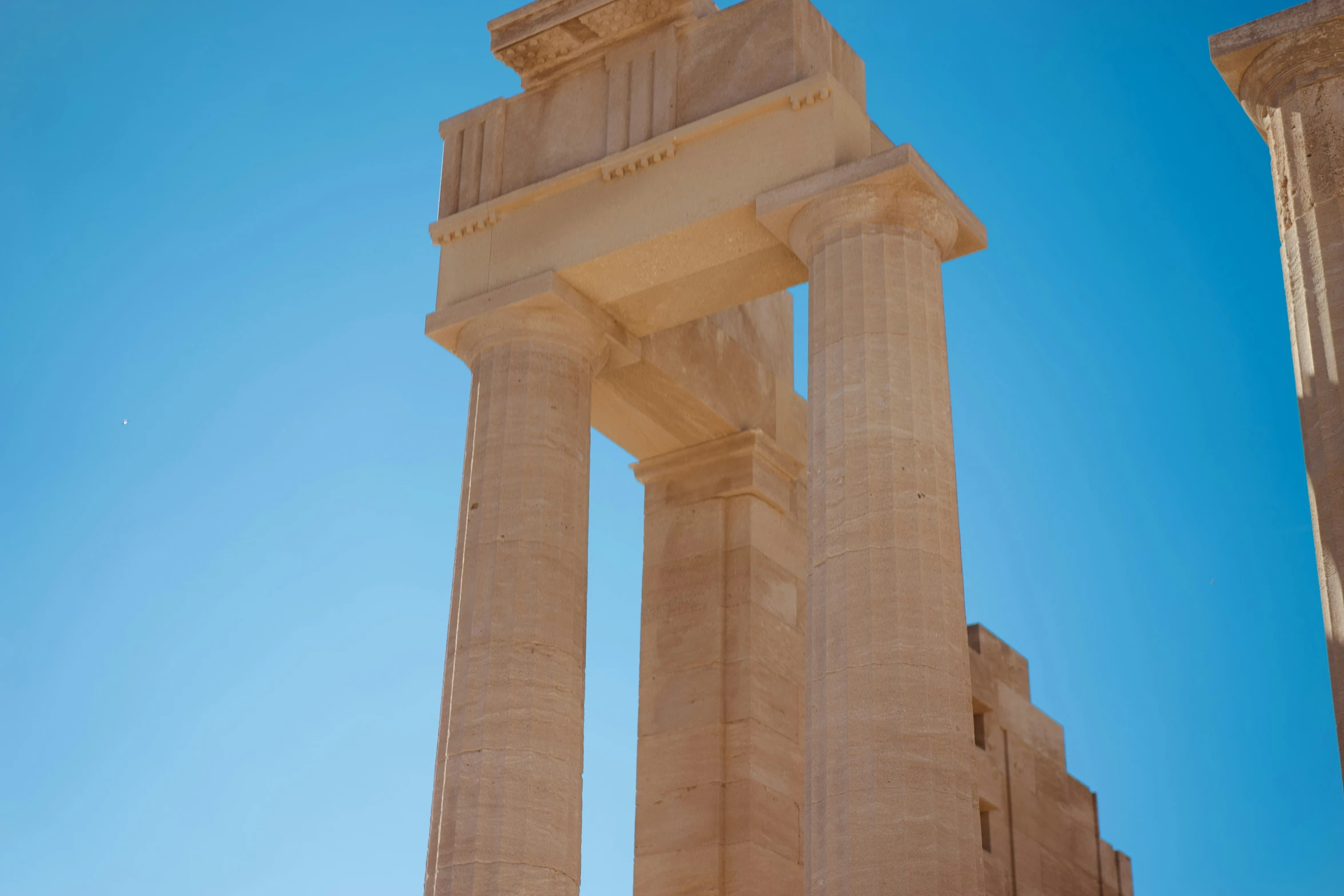 a close up of two statues in the air