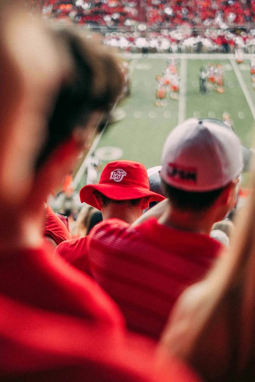 two people in a crowd at a game