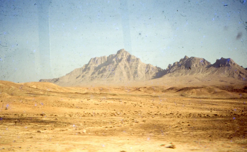 there is a landscape with mountains in the distance