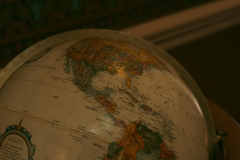 a terrestrial globe with a dark background