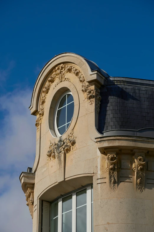 this is a very ornate window with carvings on the side