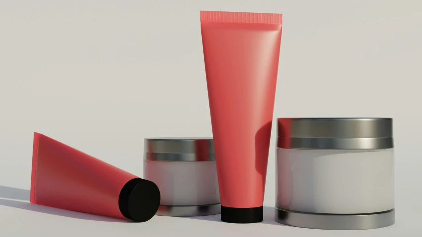 an assortment of cosmetic products, including a tube of lip polish