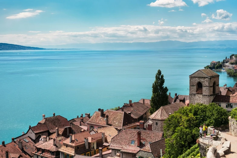 the village is overlooking an ocean and a town