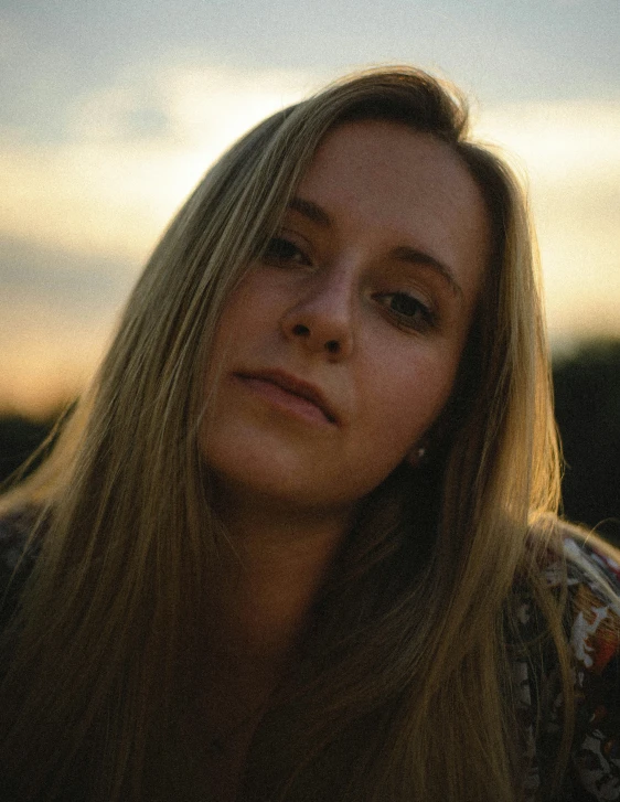 a close up image of a person with blond hair