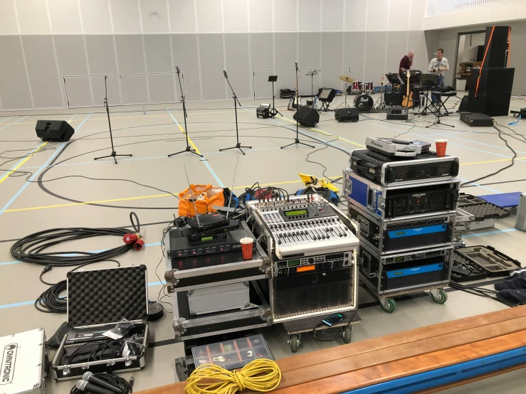 a recording studio has equipment all over the floor