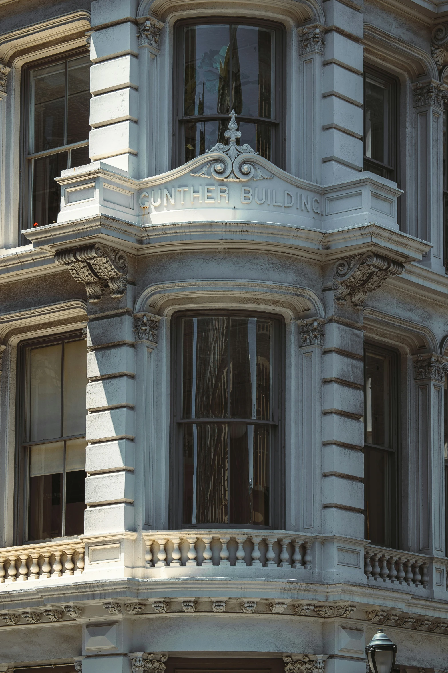 a very ornate looking old building with lots of windows