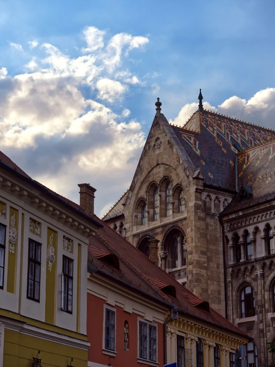 many buildings with a sky background in the evening