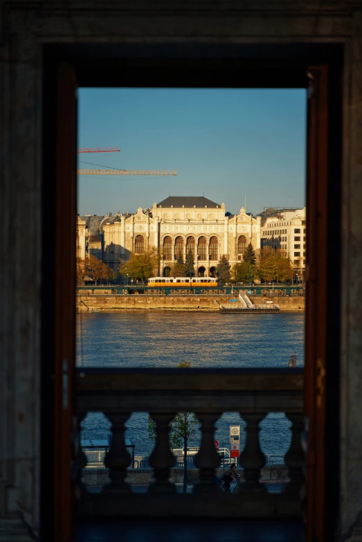 a view of a building on a body of water