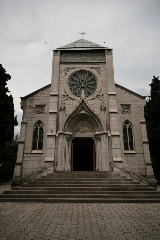 a small church with steps leading to it