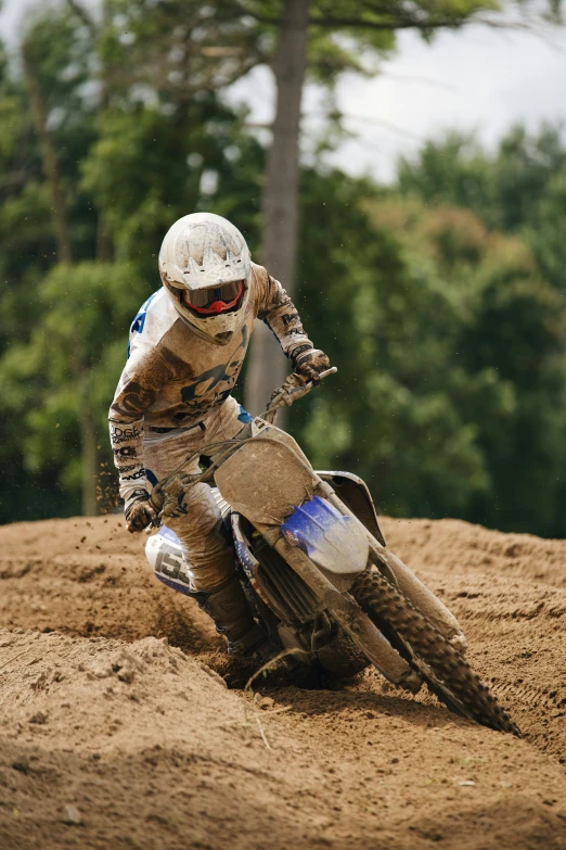 a dirt biker in the middle of a race