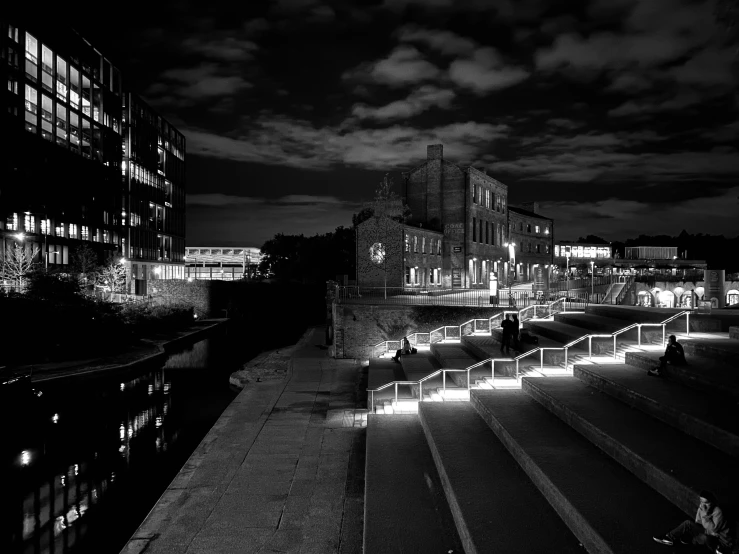 a very long building lit up by bright lights