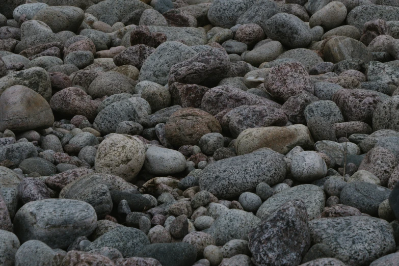 a mixture of rocks and gravel with various colors