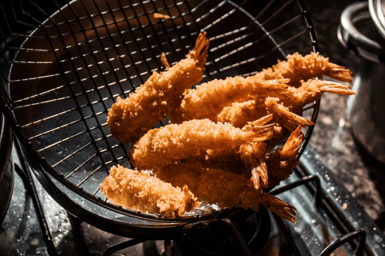 some fried food is sitting on top of a grill