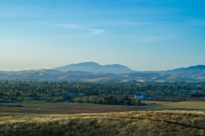 a po from above of a small rural area with mountains