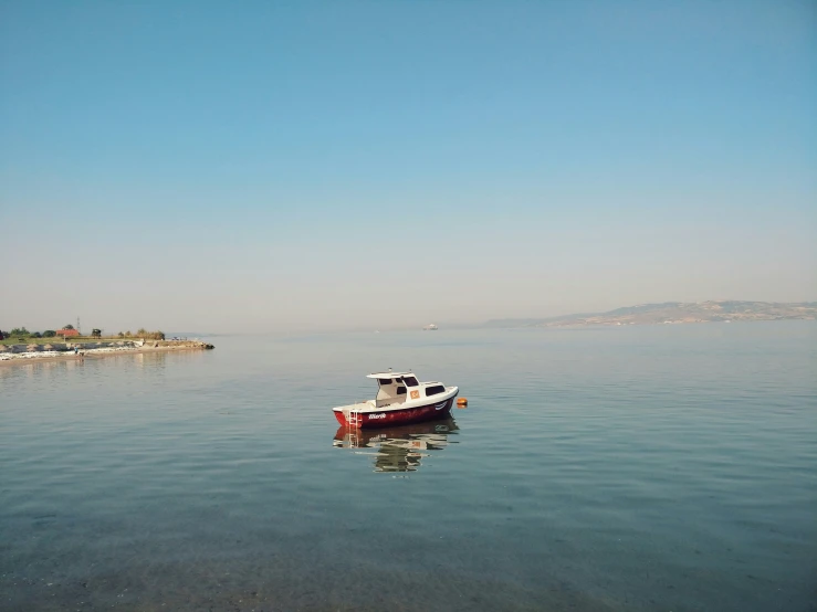 there is a boat on the water in the water